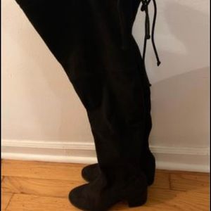 Woman’s knee high boots